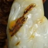 籽料俏色和田玉手把件-红掌柜