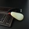 俄料和田玉挂坠-红掌柜