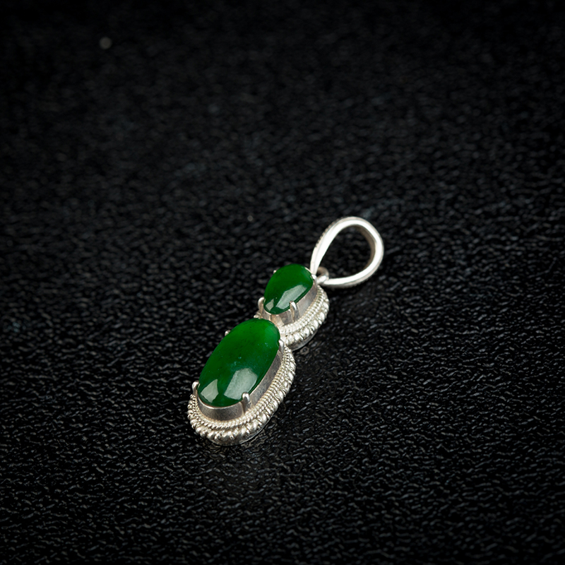 冰种翠绿翡翠戒面-红掌柜