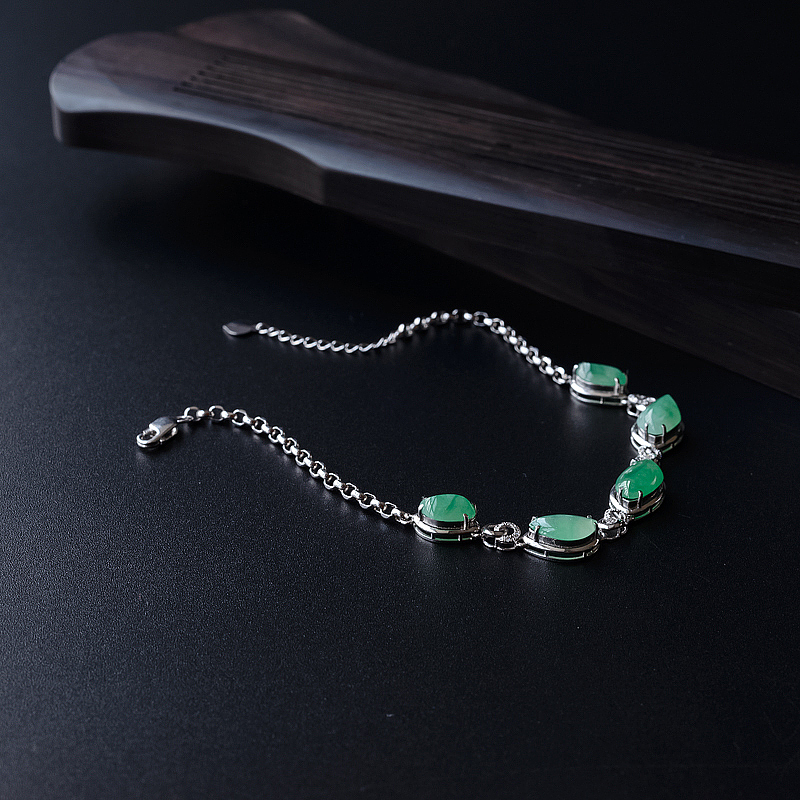 18K镶缅甸冰糯种浅绿翡翠手链-红掌柜