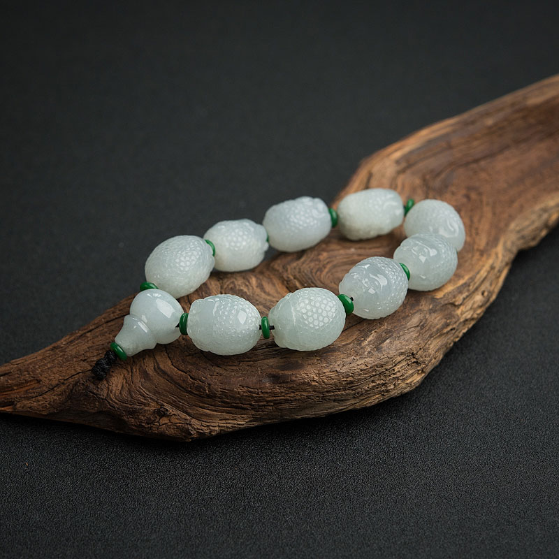 缅甸天然浅绿翡翠佛头手串-红掌柜