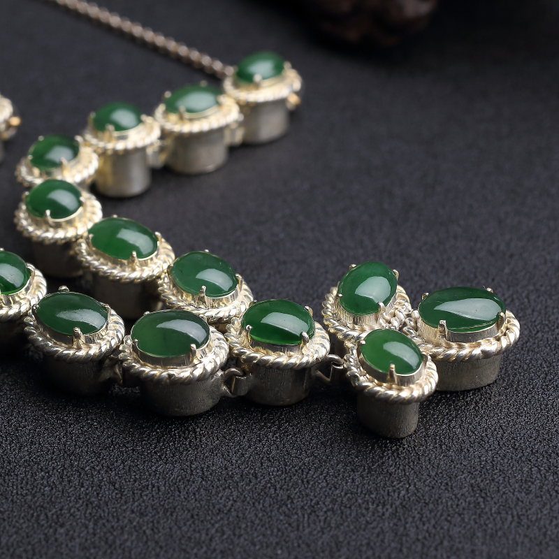 冰种阳绿翡翠戒面-红掌柜