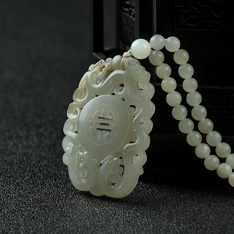 和田白玉籽料仿古龙纹吊坠-红掌柜