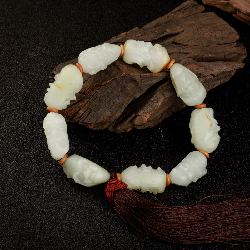 新疆籽料俏色和田玉罗汉手把件-红掌柜