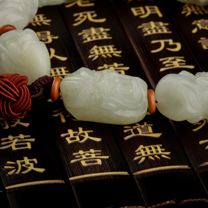 籽料和田玉罗汉手把件-红掌柜