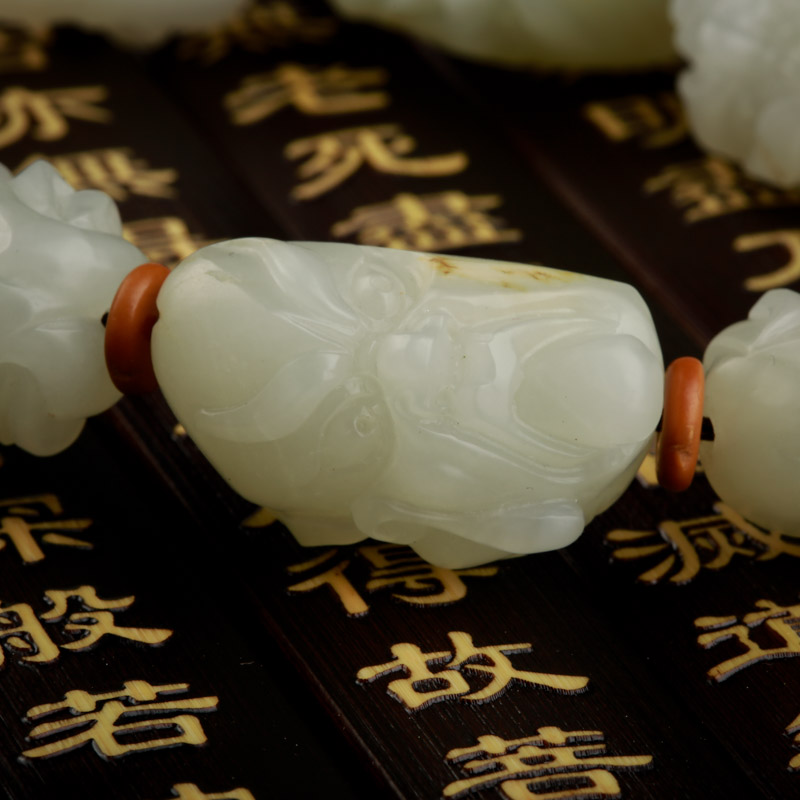 和田玉罗汉手把件-红掌柜