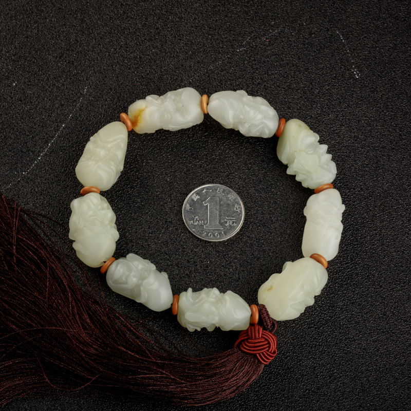 籽料和田玉手把件-红掌柜