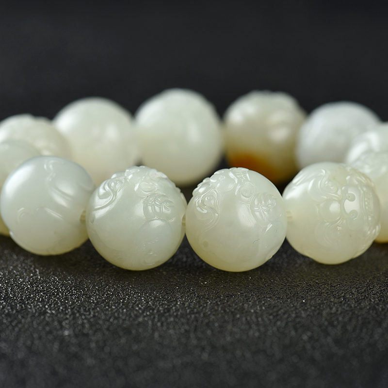 和田青白玉瑞兽头手串-红掌柜