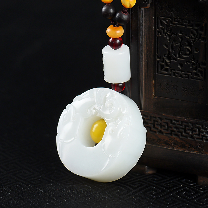 新疆山料和田白玉龙凤呈祥手把件-红掌柜