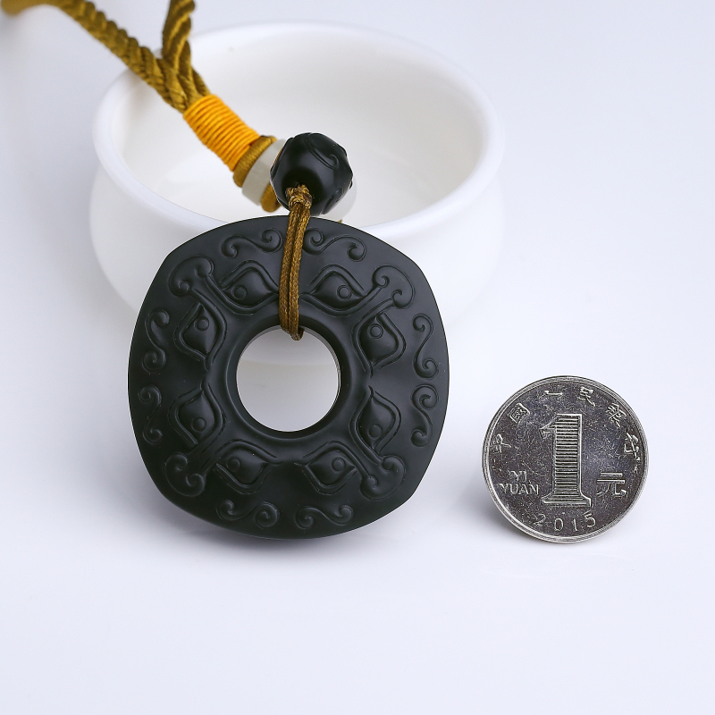 和田墨玉兽面手把件-红掌柜