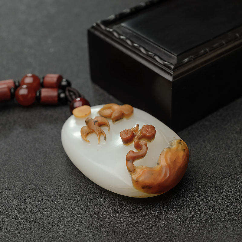 和田玉手把件-红掌柜