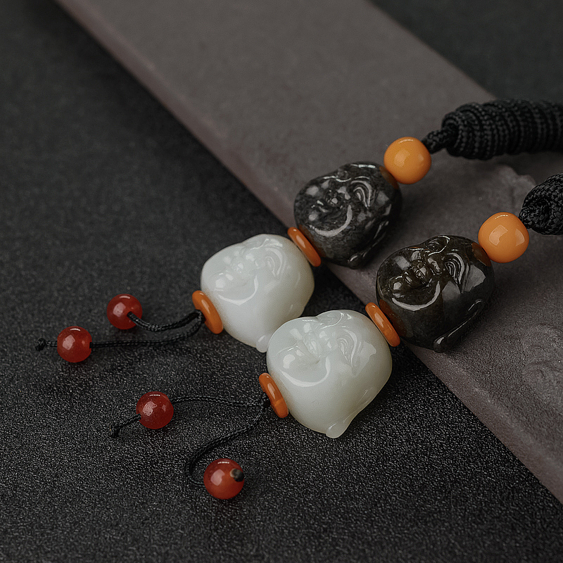 和田玉佛头吊坠-红掌柜