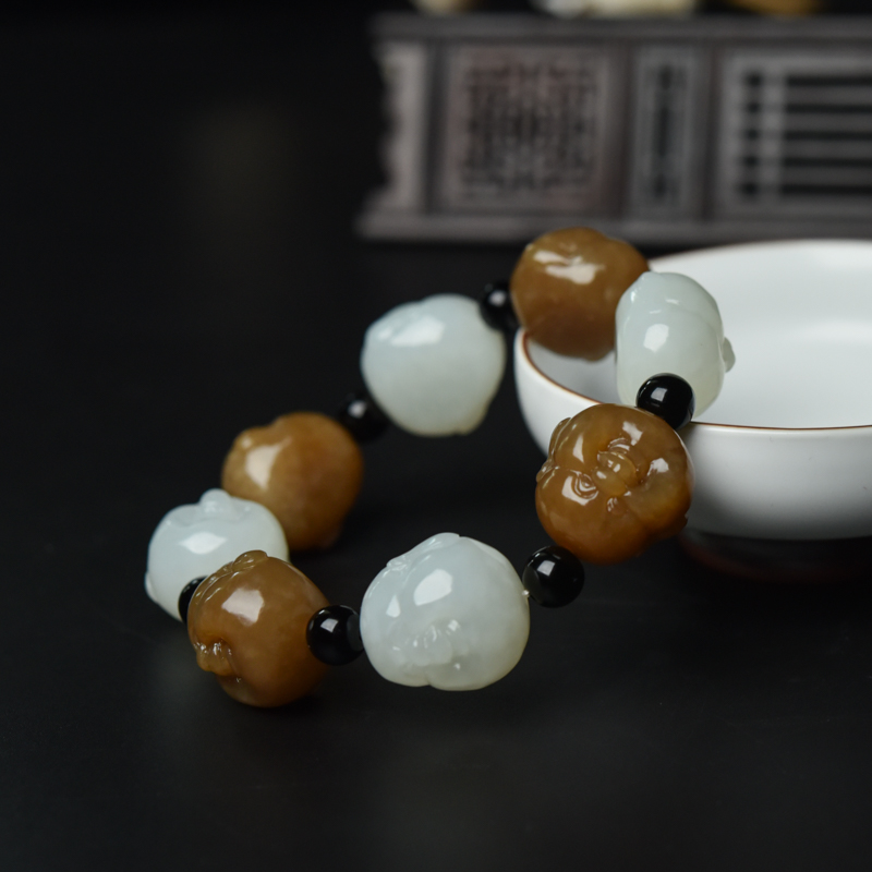 山料俏色和田玉佛头手串-红掌柜