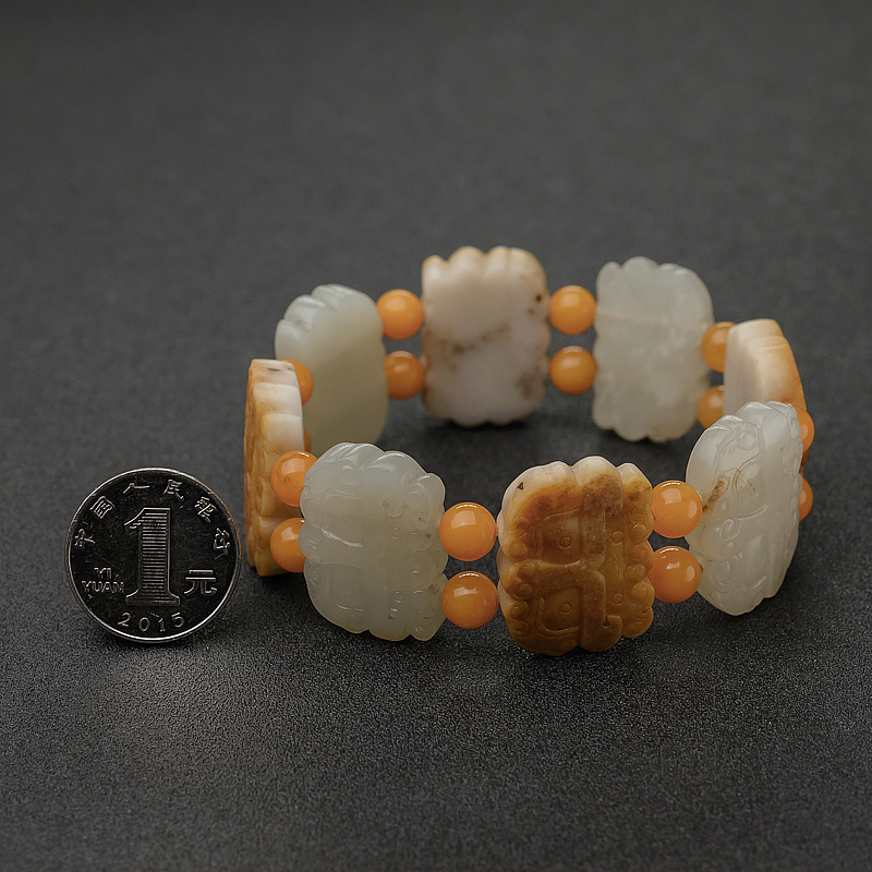 籽料俏色和田玉兽脸单圈手串-红掌柜