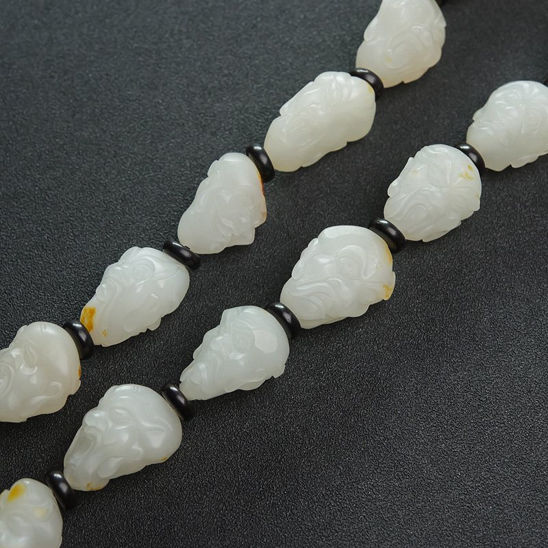 天然和田白玉罗汉头手持-红掌柜