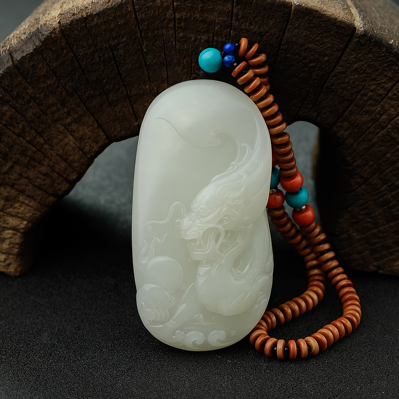 新疆天然籽料和田白玉龙手把件 - 红掌柜