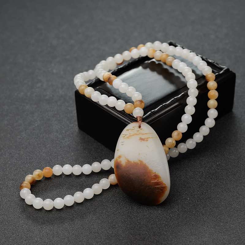 籽料俏色和田山水意境吊坠-红掌柜