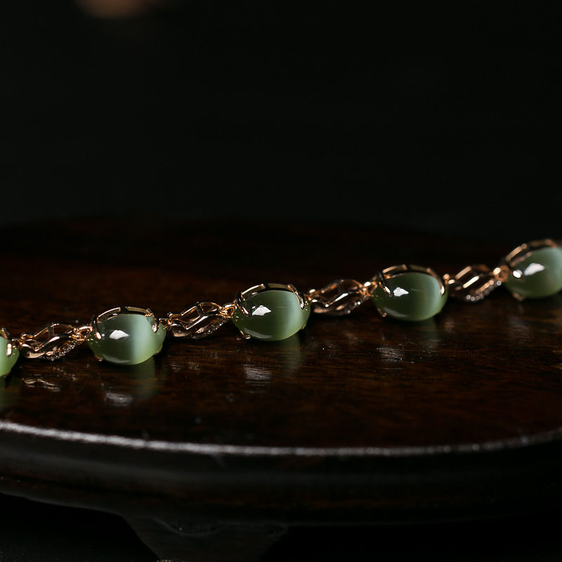 18K山料猫眼和田玉手链-红掌柜