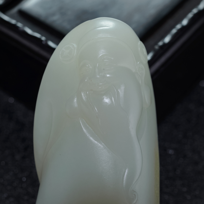 和田白玉财神手把件-红掌柜