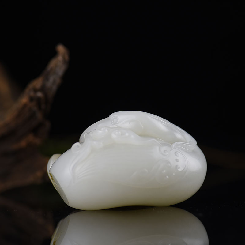 籽料俏色和田玉手把件-红掌柜