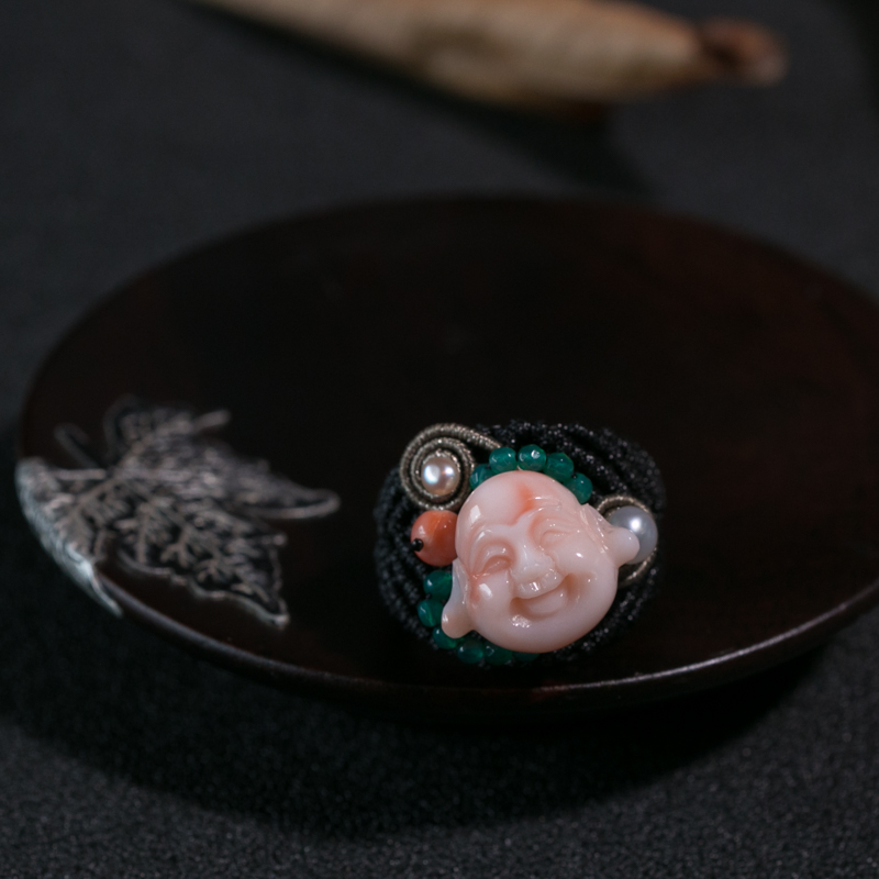 台湾天然深水珊瑚佛头编织戒指-红掌柜