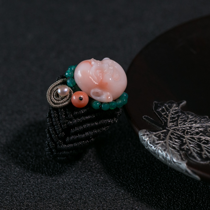 台湾深水珊瑚佛头编织戒指-红掌柜