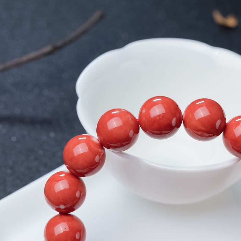 MOMO橘色珊瑚手串-红掌柜