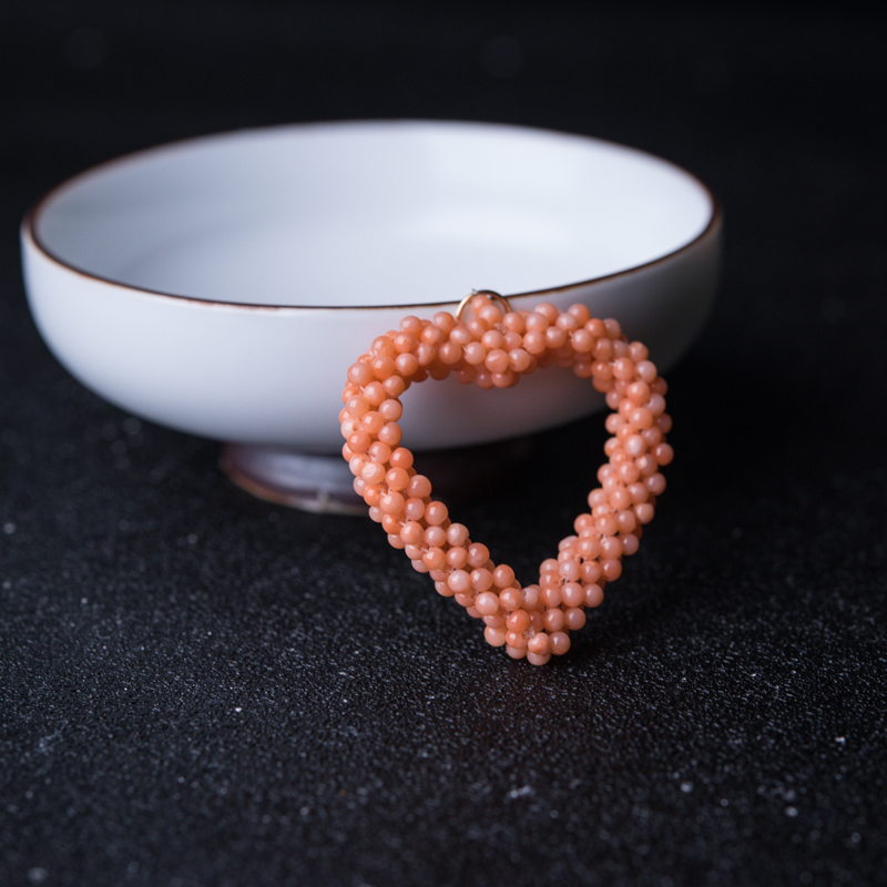 台湾天然珊瑚编织心形吊坠-红掌柜