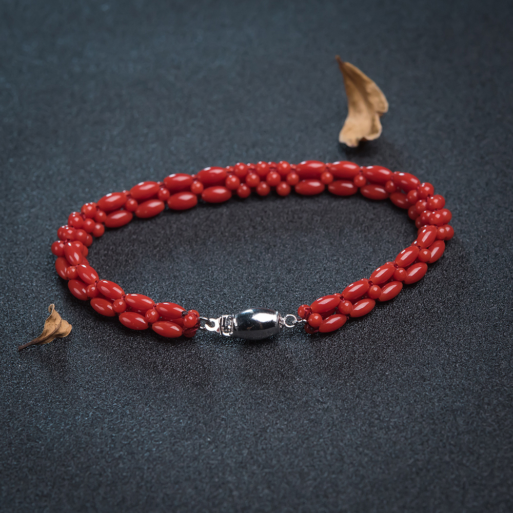 沙丁红珊瑚米珠编织手链-红掌柜