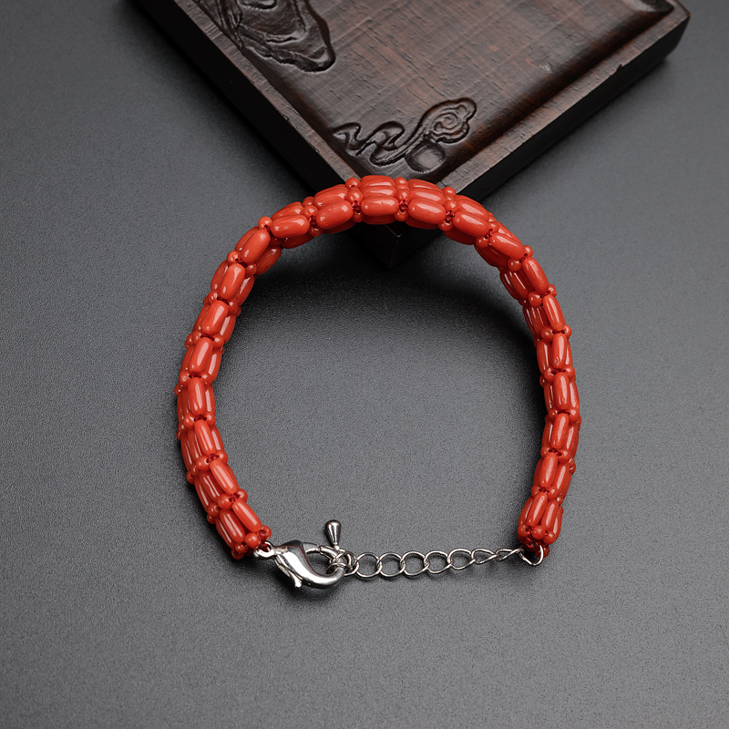 意大利天然沙丁珊瑚豆形手链-红掌柜