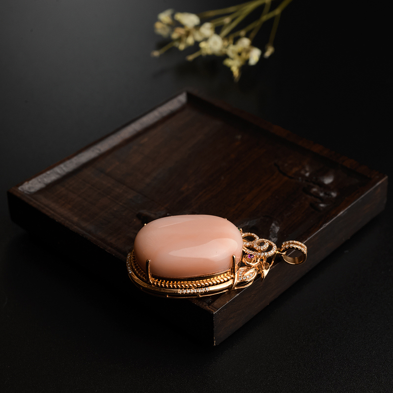 孩儿面珊瑚吊坠-红掌柜