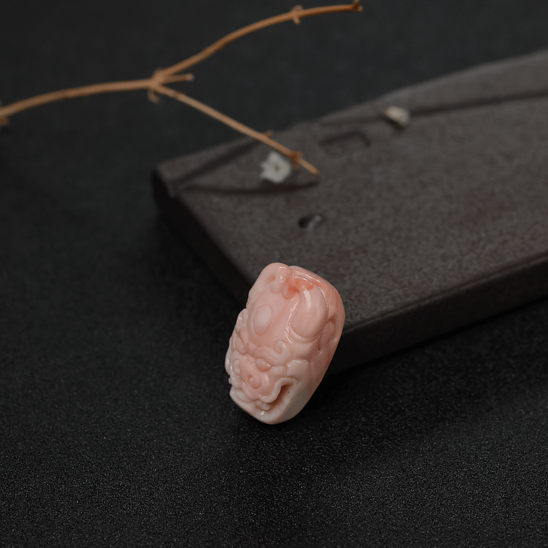 粉色珊瑚兽头吊坠-红掌柜