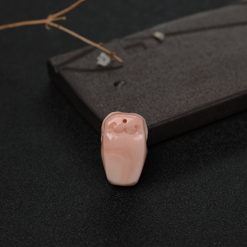 珊瑚兽头吊坠-红掌柜