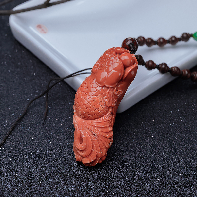 橘红珊瑚连年有余手把件-红掌柜