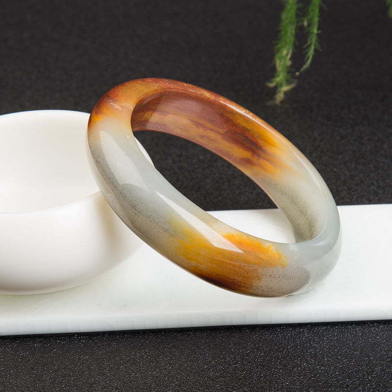 天然黑金沙料俏色黄龙玉手镯-红掌柜