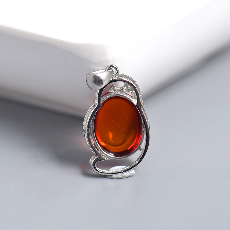 银镶血珀挂坠-红掌柜