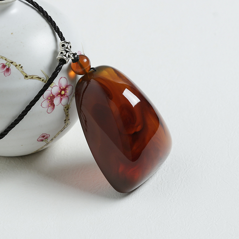 天然棕红琥珀挂件-红掌柜