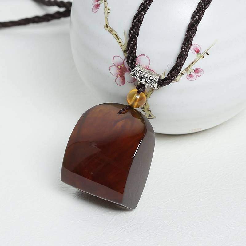 天然棕红琥珀挂件-红掌柜