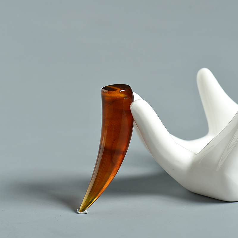 琥珀狼牙吊坠-红掌柜