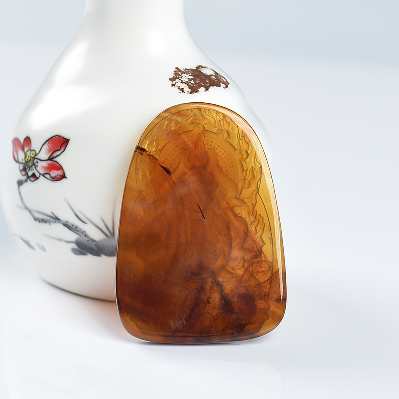 琥珀千手观音吊坠-红掌柜