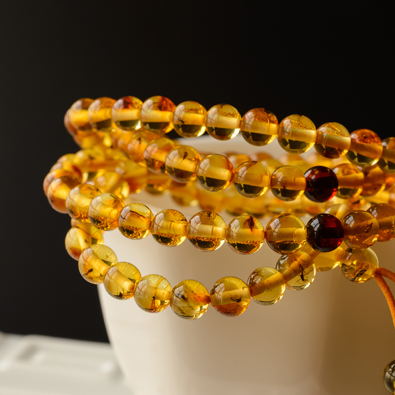 琥珀佛珠-红掌柜