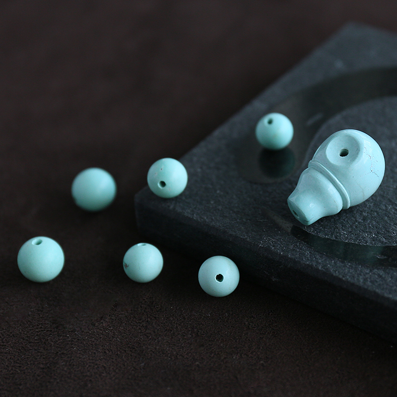 高瓷绿松石三通弟子珠-红掌柜