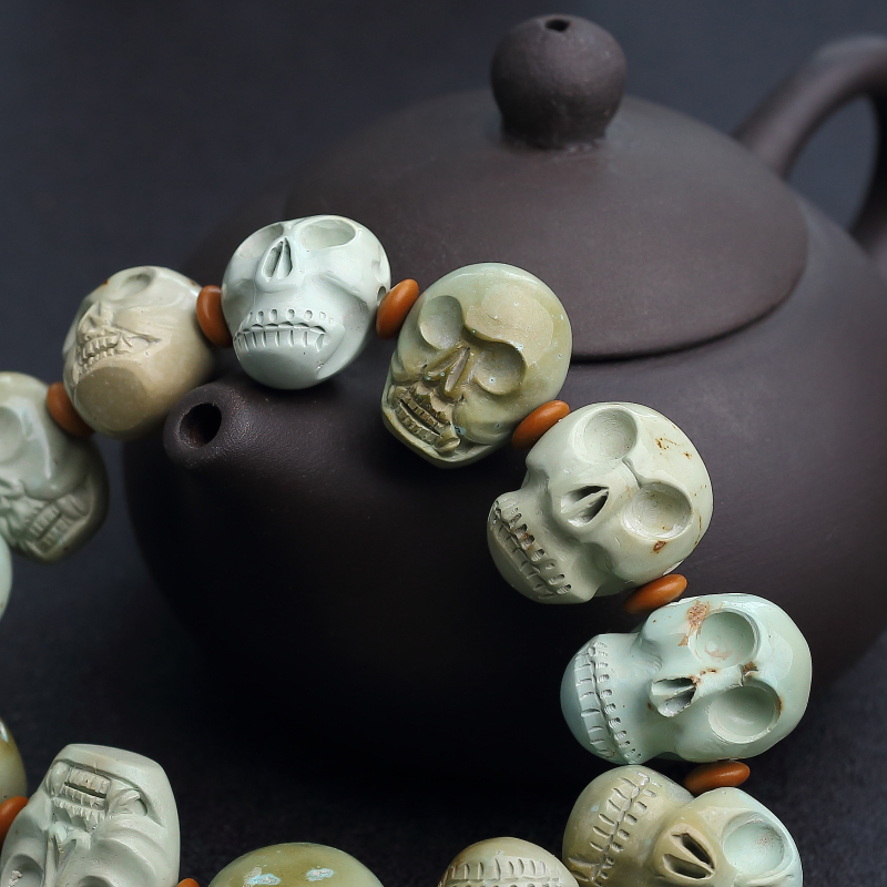 高瓷铁线绿松石骷髅头单圈手串-红掌柜