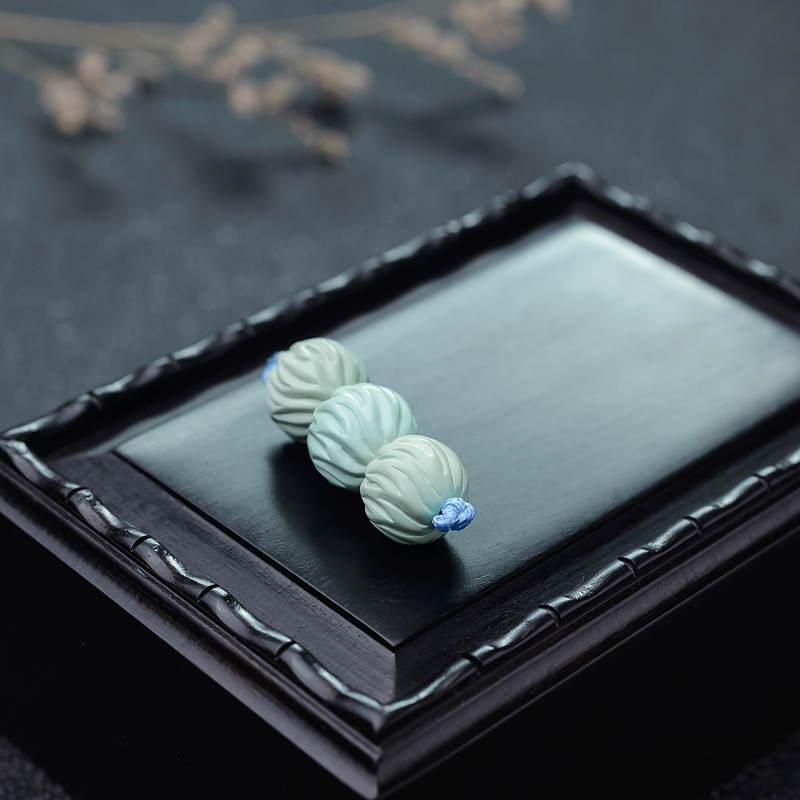 中高瓷绿松石雕刻珠-红掌柜