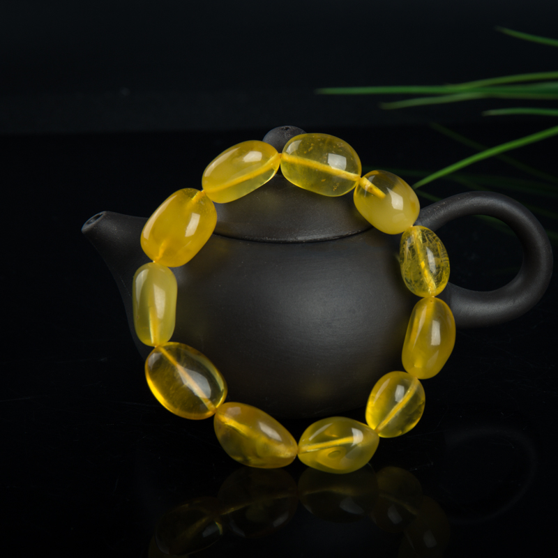 天然金绞蜜手串-红掌柜