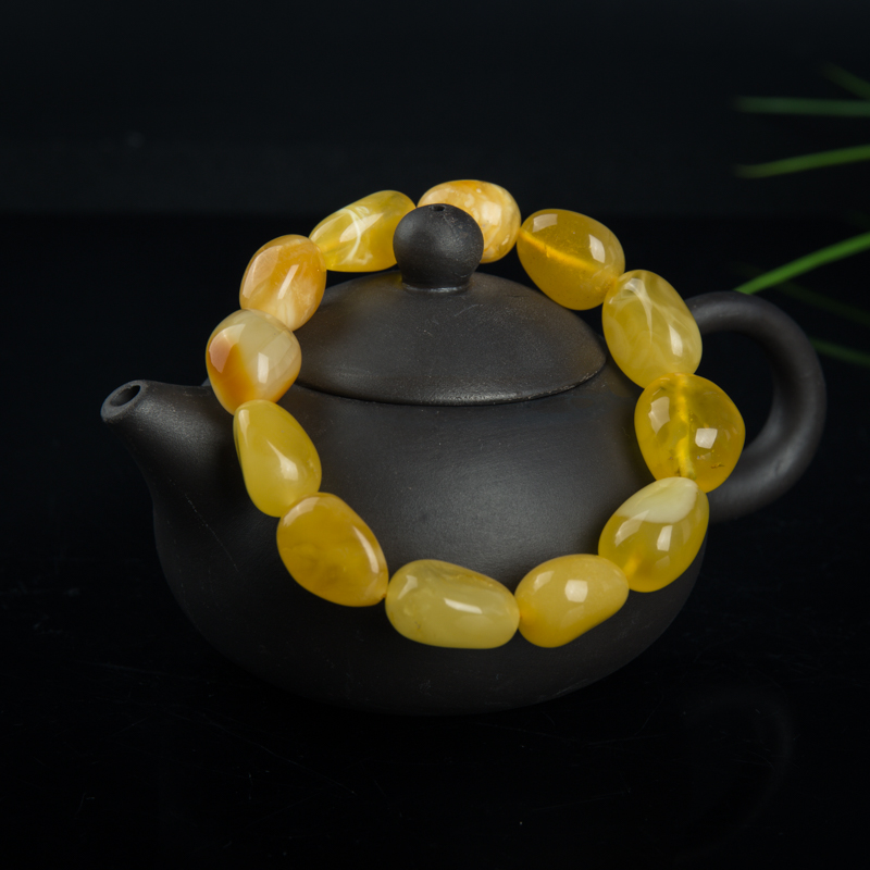 天然鸡油黄金绞蜜手串-红掌柜