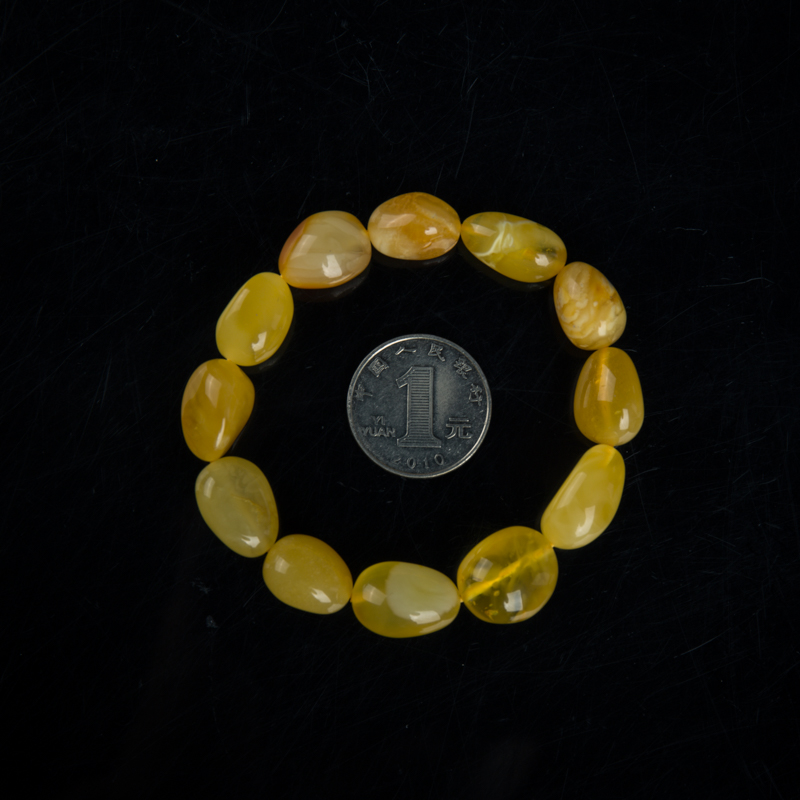 波罗的海鸡油黄金绞蜜手串-红掌柜