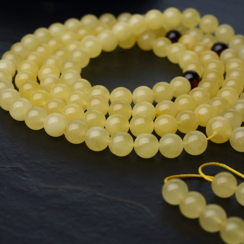 波罗的海天然鸡油黄金绞蜜佛珠-红掌柜