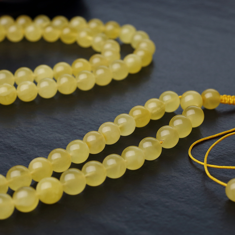 波罗的海天然金绞蜜108佛珠-红掌柜