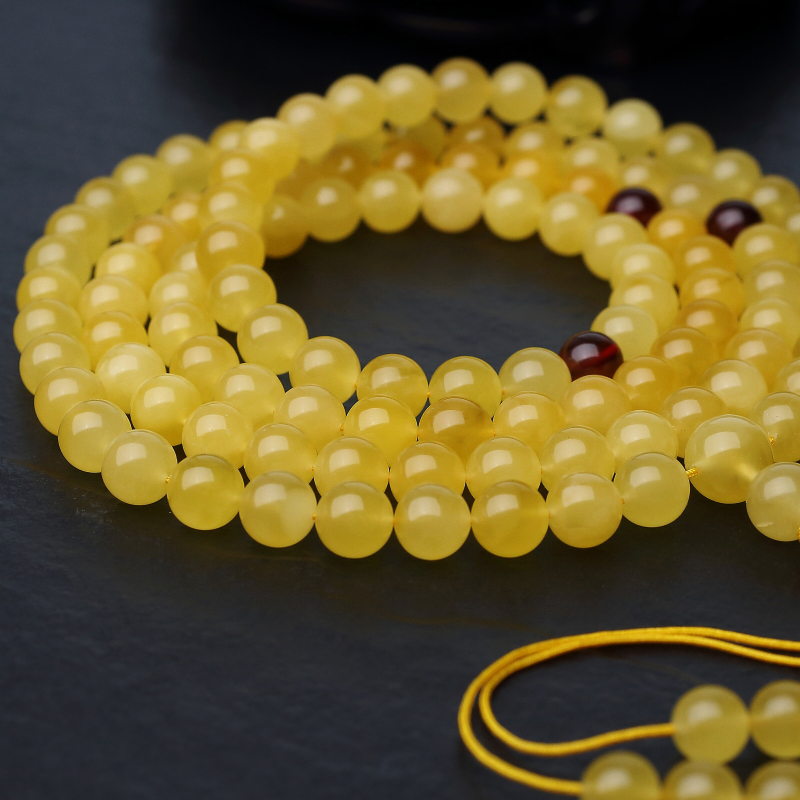 波罗的海天然鸡油黄金绞蜜佛珠-红掌柜